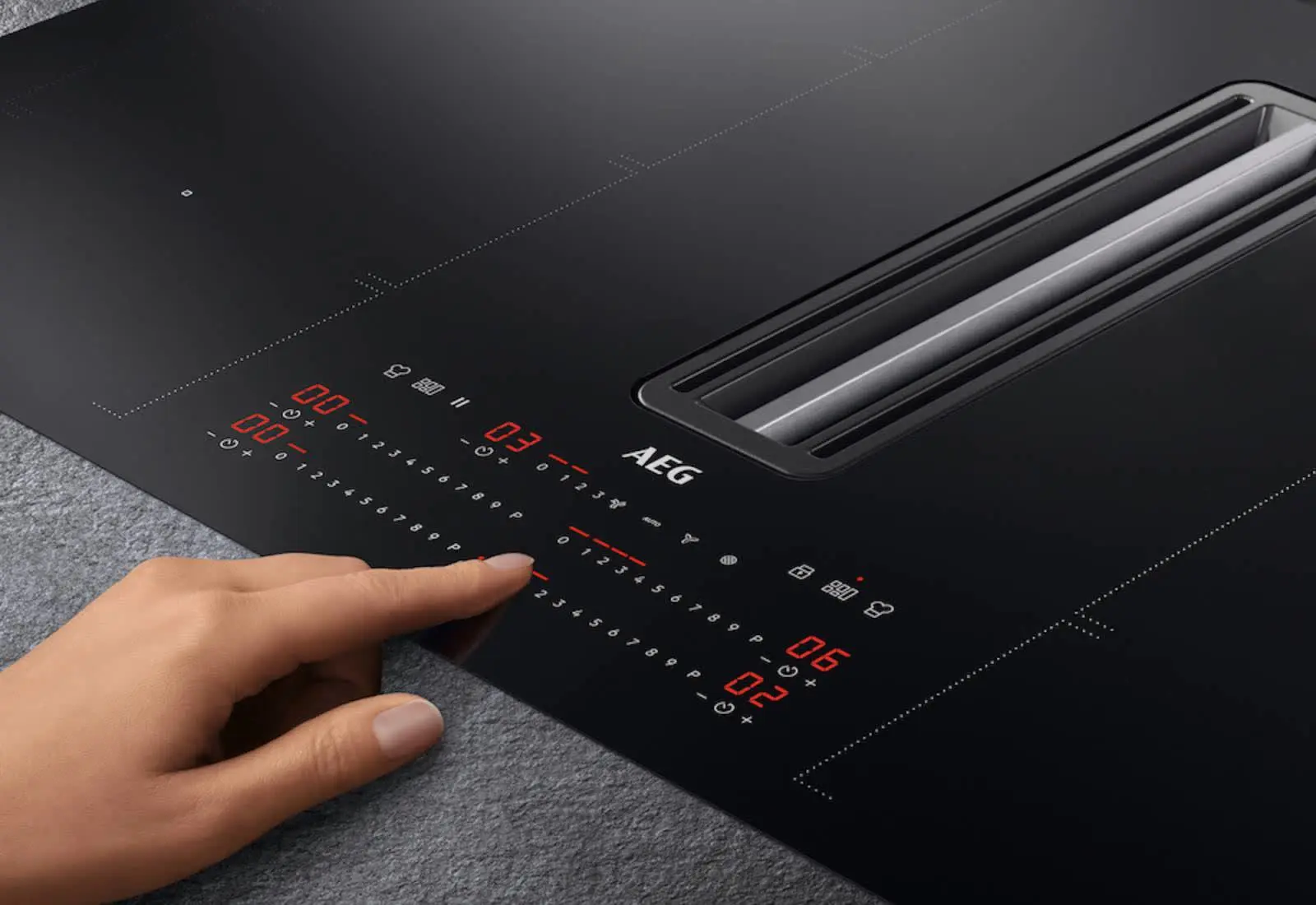 Immagine AEG, piano cottura con cappa integrata 1